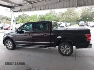 2019 Ford F-150 XL with VIN 1FTEW1CB6KKC92946, listed as a IAAI auction lot 41652249 with 133,883 mi miles and . Bid and sale history available at carsss.com. Image 14.