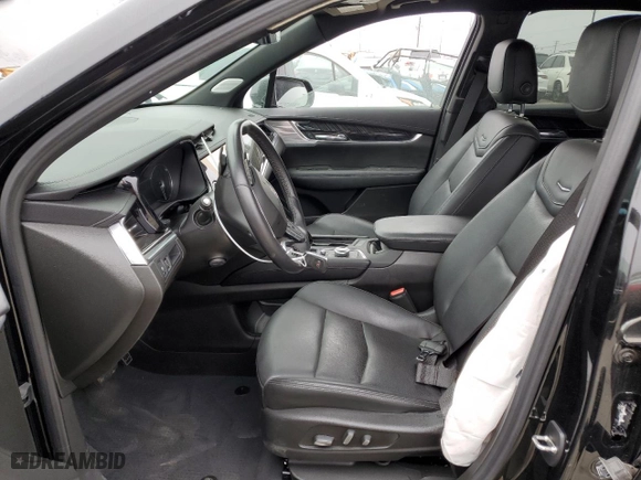 2023 Cadillac XT6 FWD Premium Luxury with VIN 1GYKPCRS5PZ119186, listed as a Copart auction lot 50577175 with 32,189 mi miles and Salvage Title. Bid and sale history available at carsss.com. Image 7.