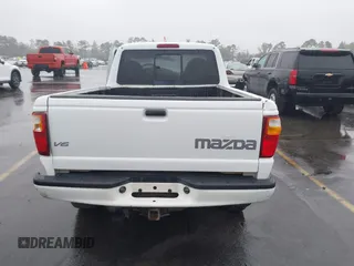 2002 Mazda B-Series 2WD Truck DS with VIN 4F4YR12U82TM11900, listed as a IAAI auction lot 40773356 with 118,353 mi miles. Bid and sale history available at carsss.com. Image 16.