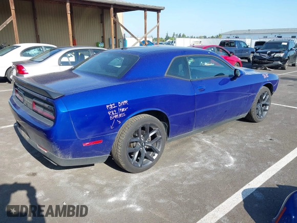 2019 Dodge Challenger SXT z VIN 2C3CDZAG0KH530232, wystawiony jako IAAI lot #42101045 z przebiegiem 57 693 mil mil oraz . Historia ofert i sprzedaży dostępna na DreamBid. Obrazek 4.
