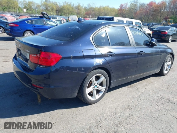 2013 BMW 3 Series 328i xDrive with VIN WBA3B3G54DNR80235, listed as a IAAI auction lot 42105883 with 144,023 mi miles. Bid and sale history available at carsss.com. Image 4.