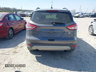 2014 Ford Escape SE with VIN 1FMCU9GX0EUC75145, listed as a IAAI auction lot 42048519 with 186,670 mi miles and . Bid and sale history available at DreamBid. Image 16.