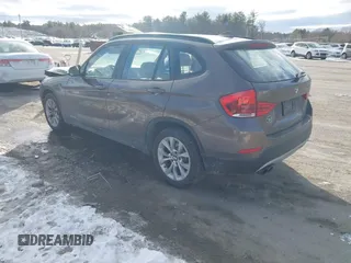 2014 BMW X1 xDrive28i with VIN WBAVL1C56EVY19340, listed as a IAAI auction lot 41340436 with 85,867 mi miles. Bid and sale history available at carsss.com. Image 3.