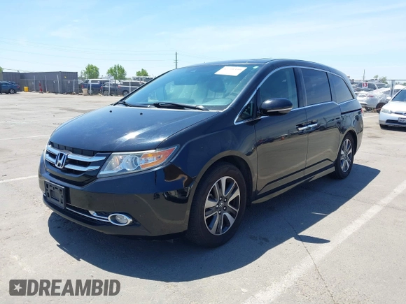2014 Honda Odyssey Touring with VIN 5FNRL5H99EB133864, listed as a IAAI auction lot 42201359 with 122,490 mi miles and . Bid and sale history available at DreamBid. Image 17.