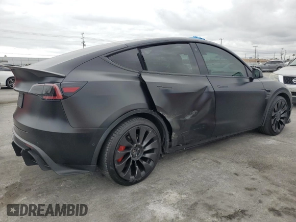 2022 Tesla Model Y Performance with VIN 7SAYGDEF7NF318647, listed as a Copart auction lot 53822465 with 38,724 mi miles and Salvage title. Bid and sale history available at DreamBid. Image 3.