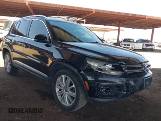 2012 Volkswagen Tiguan SE with VIN WVGBV7AX7CW559296, listed as a IAAI auction lot 42489468 with 120,210 mi miles and . Bid and sale history available at DreamBid. Image 1.