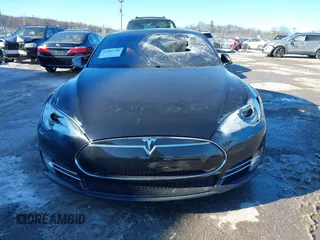 2013 Tesla Model S with VIN 5YJSA1CNODFP07903, listed as a IAAI auction lot 41281788 with Not Provided miles. Bid and sale history available at carsss.com. Image 12.