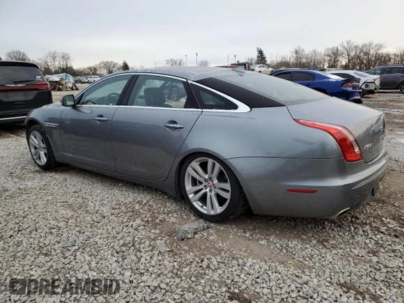 2015 Jaguar XJ with VIN SAJWA2GZ4F8V82350, listed as a Copart auction lot 83824414 with 47,767 mi miles and Salvage Title. Bid and sale history available at carsss.com. Image 2.