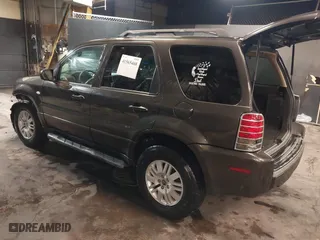 2005 Mercury Mariner Luxury with VIN 4M2YU57115DJ31547, listed as a IAAI auction lot 41565468 with 68,061 mi miles. Bid and sale history available at carsss.com. Image 3.
