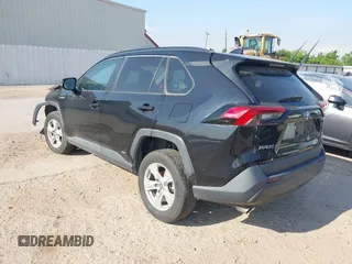 2019 Toyota RAV4 Hybrid LE with VIN 2T3MWRFV3KW007322, listed as a IAAI auction lot 42032500 with 91,985 mi miles and . Bid and sale history available at DreamBid. Image 3.