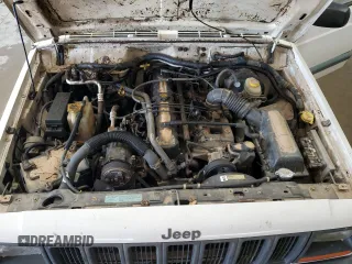 1997 Jeep Cherokee Sport with VIN 1J4FJ68S2VL518188, listed as a Copart auction lot 77459464 with 0 mi miles and Non Repairable. Bid and sale history available at carsss.com. Image 12.
