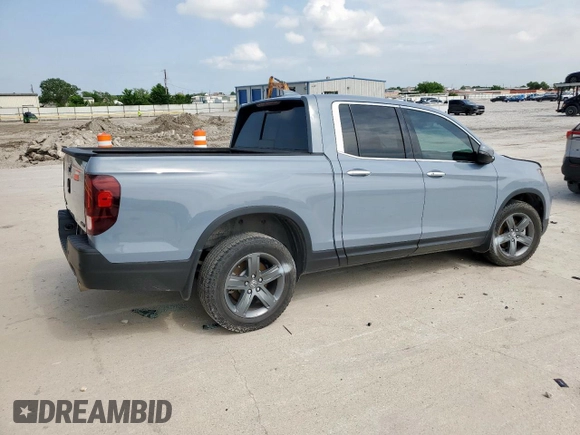 2023 Honda Ridgeline RTL-E with VIN 5FPYK3F76PB036572, listed as a Copart auction lot 54717085 with 34,516 mi miles and Salvage title. Bid and sale history available at DreamBid. Image 3.