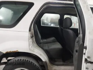 2004 Ford Escape XLS with VIN 1FMYU921X4KA88997, listed as a IAAI auction lot 41520334 with 211,761 mi miles and . Bid and sale history available at DreamBid. Image 8.