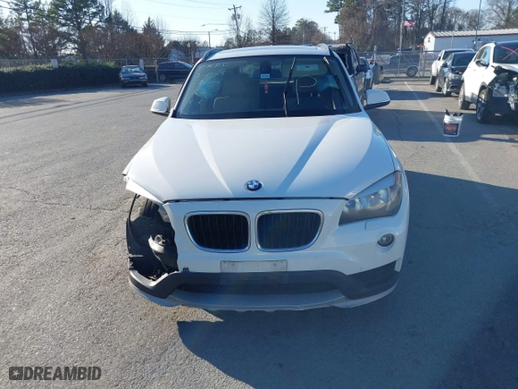 2015 BMW X1 xDrive28i with VIN WBAVL1C50FVY26009, listed as a IAAI auction lot 41495667 with 109,807 mi miles. Bid and sale history available at carsss.com. Image 12.
