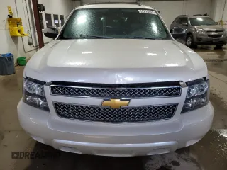 2012 Chevrolet Suburban LTZ with VIN 1GNSKKE74CR325522, listed as a Copart auction lot 52215745 with 214,973 mi miles and Clean Title. Bid and sale history available at carsss.com. Image 5.
