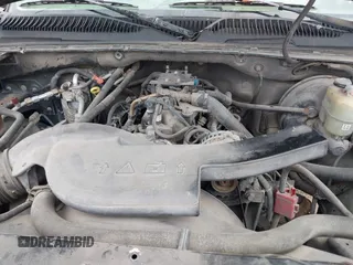 2002 Chevrolet Tahoe LT z VIN 1GNEC13ZX2R279380, wystawiony jako IAAI lot #42324646 z przebiegiem 188 781 mil mil oraz . Historia ofert i sprzedaży dostępna na DreamBid. Obrazek 10.