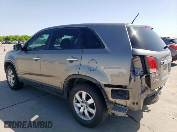 2011 Kia Sorento LX with VIN 5XYKT3A1XBG144869, listed as a Copart auction lot 52921865 with 186,896 mi miles and Salvage Title. Bid and sale history available at carsss.com. Image 2.