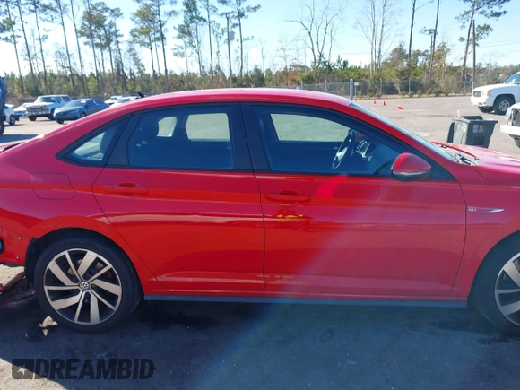 2019 Volkswagen Jetta GLI S z VIN 3VW5T7BU3KM225015, wystawiony jako IAAI lot #41352228 z przebiegiem 96 874 mil mil oraz . Historia ofert i sprzedaży dostępna na DreamBid. Obrazek 13.