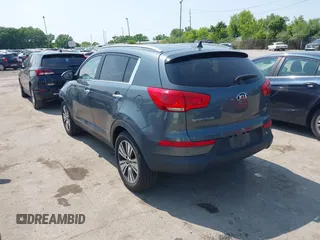 2015 Kia Sportage EX with VIN KNDPCCAC3F7720683, listed as a IAAI auction lot 42390430 with 102,867 mi miles and . Bid and sale history available at DreamBid. Image 3.