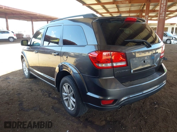 2015 Dodge Journey SXT with VIN 3C4PDCBG6FT569512, listed as a IAAI auction lot 42532676 with 98,952 mi miles and . Bid and sale history available at DreamBid. Image 3.