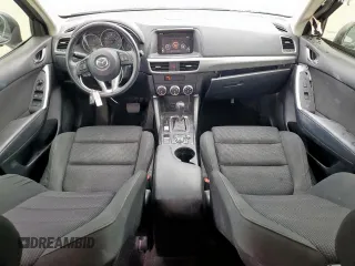 2016 Mazda CX-5 Touring z VIN JM3KE2CY7G0654292, wystawiony jako Copart lot #53433745 z przebiegiem 168 273 mil mil oraz Szkoda całkowita • Salvage title. Historia ofert i sprzedaży dostępna na DreamBid. Obrazek 8.