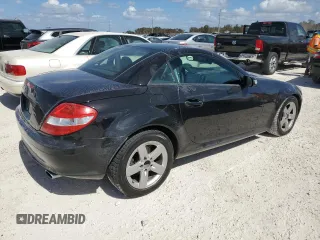 2006 Mercedes-Benz SLK-Class 3.0L with VIN WDBWK54F66F102164, listed as a Copart auction lot 77269014 with 135,786 mi miles and Salvage Title. Bid and sale history available at carsss.com. Image 3.