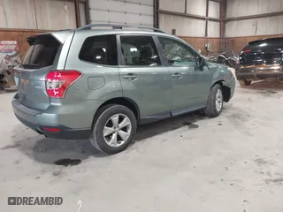 2014 Subaru Forester 2.5i Limited with VIN JF2SJAJC7EH512790, listed as a IAAI auction lot 42097522 with 112,419 mi miles. Bid and sale history available at carsss.com. Image 4.