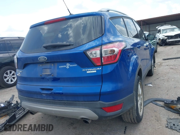 2017 Ford Escape Titanium with VIN 1FMCU0JD3HUE35131, listed as a IAAI auction lot 42062019 with 108,470 mi miles and . Bid and sale history available at DreamBid. Image 4.