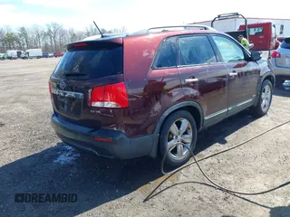 2012 Kia Sorento EX with VIN 5XYKUDA22CG293371, listed as a IAAI auction lot 41869105 with 69,842 mi miles. Bid and sale history available at carsss.com. Image 4.