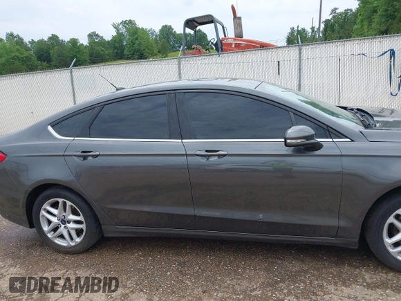 2016 Ford Fusion SE z VIN 3FA6P0H77GR367727, wystawiony jako IAAI lot #42274323 z przebiegiem 309 852 mil mil oraz . Historia ofert i sprzedaży dostępna na DreamBid. Obrazek 14.