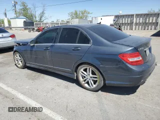 2014 Mercedes-Benz C 250 Sport with VIN WDDGF4HB4EG245317, listed as a Copart auction lot 54272695 with 121,599 mi miles and Salvage title. Bid and sale history available at DreamBid. Image 2.
