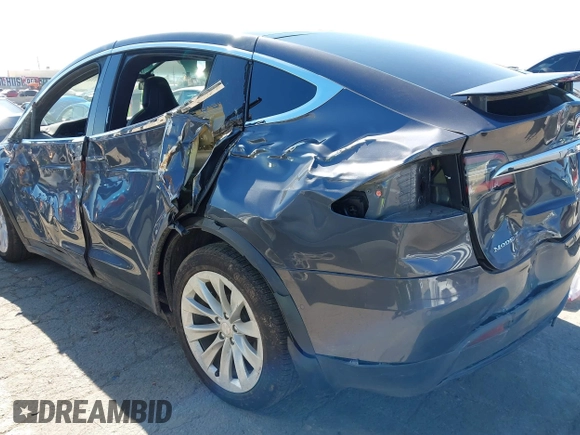 2018 Tesla Model X 75D with VIN 5YJXCBE26JF121937, listed as a IAAI auction lot 41652666 with 93,478 mi miles and . Bid and sale history available at carsss.com. Image 19.