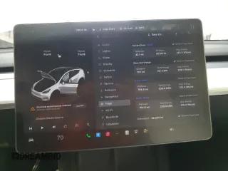 2023 Tesla Model Y Performance z VIN 7SAYGDEF6PF798103, wystawiony jako Copart lot #53607895 z przebiegiem 22 334 mil mil oraz Szkoda całkowita • Salvage title. Historia ofert i sprzedaży dostępna na DreamBid. Obrazek 9.