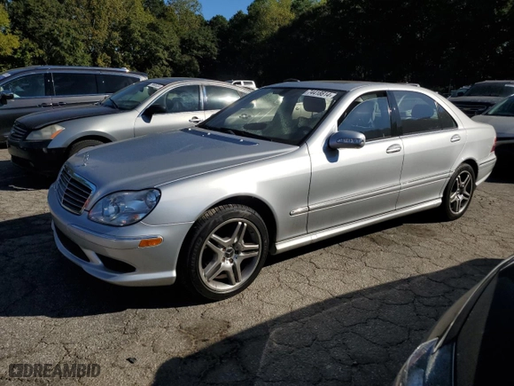 2006 Mercedes-Benz S-Class 5.0L with VIN WDBNG75J06A483468, listed as a Copart auction lot 74418814 with 36,623 mi miles and Salvage Title. Bid and sale history available at carsss.com. Image 1.