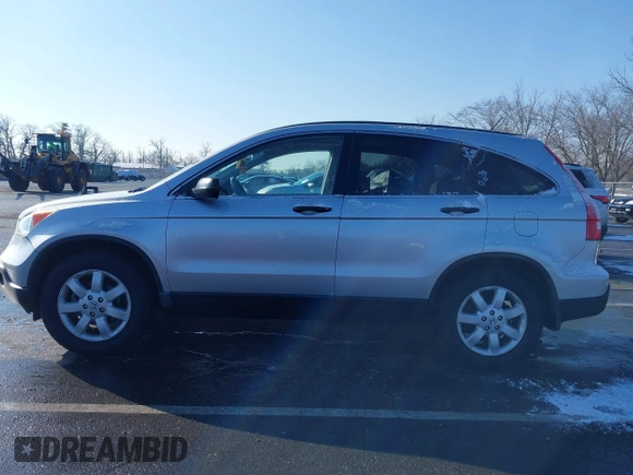 2009 Honda CR-V EX with VIN 3CZRE38589G704086, listed as a IAAI auction lot 41348951 with 128,784 mi miles and . Bid and sale history available at carsss.com. Image 14.