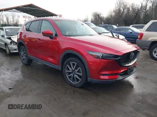 2018 Mazda CX-5 Grand Touring with VIN JM3KFBDM8J0406276, listed as a IAAI auction lot 41447355 with 70,772 mi miles. Bid and sale history available at carsss.com. Image 1.