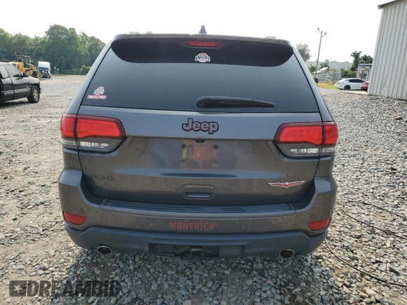 2017 Jeep Grand Cherokee Trailhawk with VIN 1C4RJFLT3HC614449, listed as a Copart auction lot 58559335 with 153,051 mi miles and Salvage title. Bid and sale history available at DreamBid. Image 6.