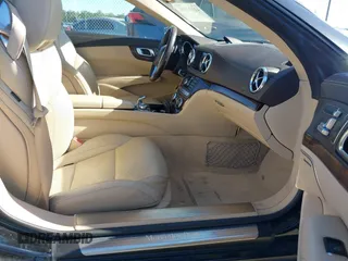 2013 Mercedes-Benz SL-Class SL 550 with VIN WDDJK7DA2DF011343, listed as a IAAI auction lot 41102104 with 74,613 mi miles. Bid and sale history available at carsss.com. Image 5.