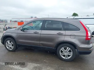 2011 Honda CR-V EX-L z VIN 5J6RE4H78BL019988, wystawiony jako IAAI lot #42220839 z przebiegiem 129 704 mil mil oraz . Historia ofert i sprzedaży dostępna na DreamBid. Obrazek 14.