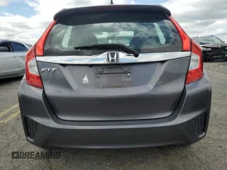 2015 Honda Fit EX-L z VIN 3HGGK5H8XFM776885, wystawiony jako Copart lot #57298225 z przebiegiem Nie podano mil oraz Szkoda całkowita • Salvage title. Historia ofert i sprzedaży dostępna na DreamBid. Obrazek 6.