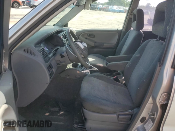 2003 Chevrolet Tracker with VIN 2CNBE13C836953178, listed as a Copart auction lot 60715605 with 128,978 mi miles and Salvage title. Bid and sale history available at DreamBid. Image 7.