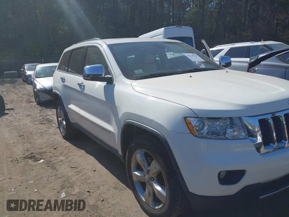2011 Jeep Grand Cherokee Overland Summit with VIN 1J4RR6GT9BC546825, listed as a IAAI auction lot 42118789 with 123,449 mi miles. Bid and sale history available at carsss.com. Image 6.