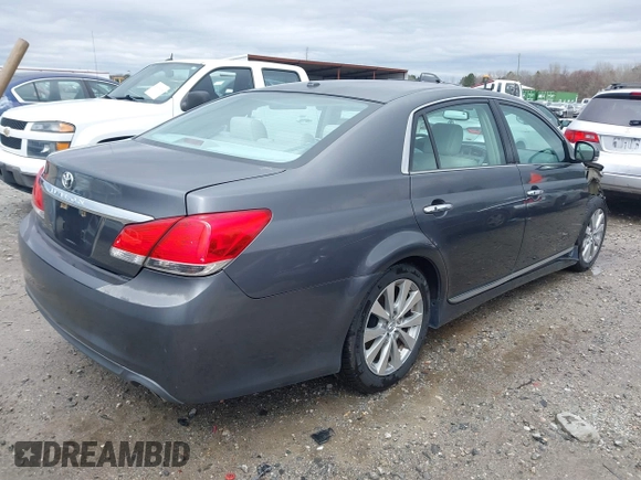 2012 Toyota Avalon with VIN 4T1BK3DB6CU459249, listed as a IAAI auction lot 41802571 with 147,955 mi miles. Bid and sale history available at carsss.com. Image 4.
