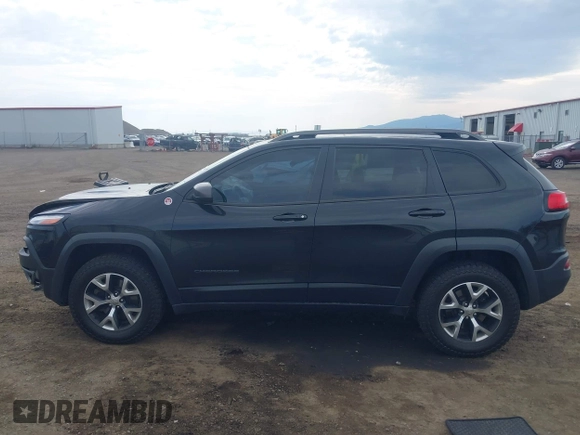2016 Jeep Cherokee Trailhawk with VIN 1C4PJMBS4GW169267, listed as a IAAI auction lot 42597291 with 79,258 mi miles and . Bid and sale history available at DreamBid. Image 14.