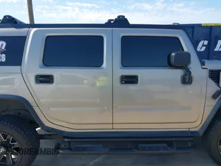 2003 Hummer H2 with VIN 5GRGN23U43H125114, listed as a IAAI auction lot 42160986 with 157,776 mi miles. Bid and sale history available at carsss.com. Image 13.