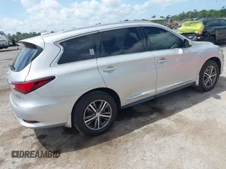 2017 Infiniti QX60 with VIN 5N1DL0MN8HC511220, listed as a IAAI auction lot 42140409 with 98,181 mi miles and . Bid and sale history available at carsss.com. Image 4.
