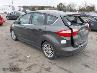 2015 Ford C-Max Energi SEL with VIN 1FADP5CU7FL121209, listed as a IAAI auction lot 41621034 with 145,648 mi miles. Bid and sale history available at carsss.com. Image 3.