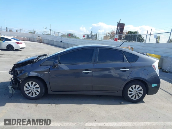 2014 Toyota Prius with VIN JTDKN3DPXE3054379, listed as a IAAI auction lot 42080665 with Not provided miles and . Bid and sale history available at DreamBid. Image 14.