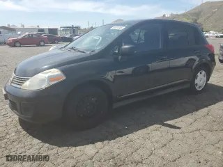 2009 Nissan Versa 1.8 SL with VIN 3N1BC13E09L421670, listed as a Copart auction lot 54051045 with 141,494 mi miles and Salvage Title. Bid and sale history available at carsss.com. Image 1.