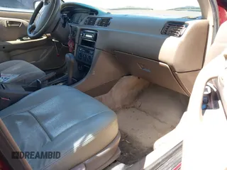 1997 Toyota Camry LE z VIN JT2BG22K3V0048428, wystawiony jako IAAI lot #41817586 z przebiegiem 349 369 mil mil oraz . Historia ofert i sprzedaży dostępna na DreamBid. Obrazek 5.